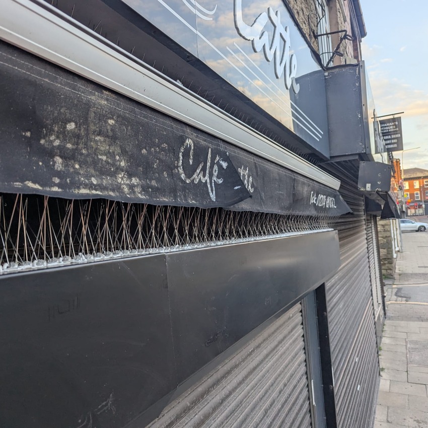 A cafe with bird spikes